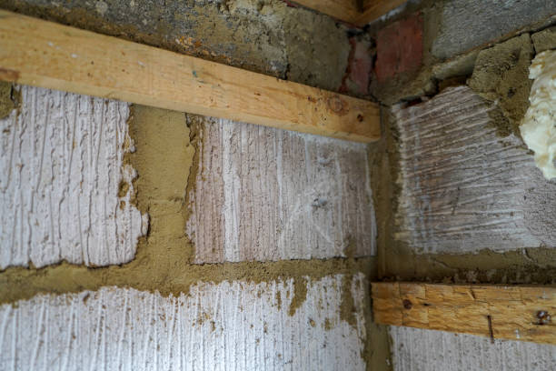 istock Inside of a roof void space with wires and insulation 1308309422