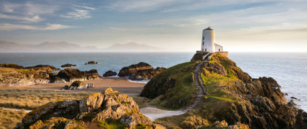 Wales coastal landscape The spectacular Twr Mawr lighthouse on Angelsey, North Wales, UK wales photos stock pictures, royalty-free photos & images