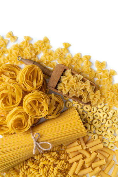 istock Assorted italian pasta raw uncooked isoated on white copy space 1308312402