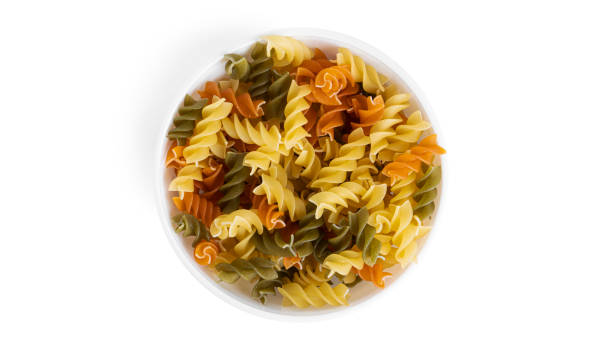 istock Colorful fusilli pasta isolated on a white background 1308314814