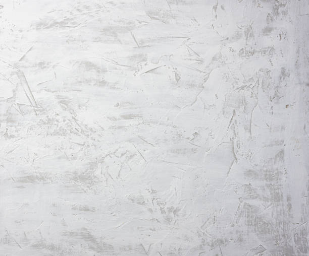 istock texture of gray white cement wall with spatula bumps, full frame 1308317348
