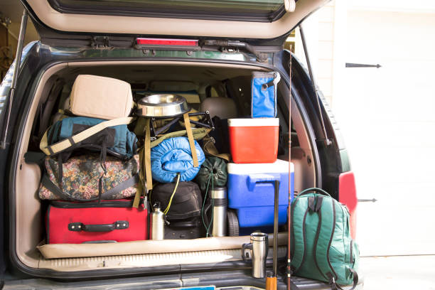 istock Packing vehicle for camping vacation trip. 1308319578