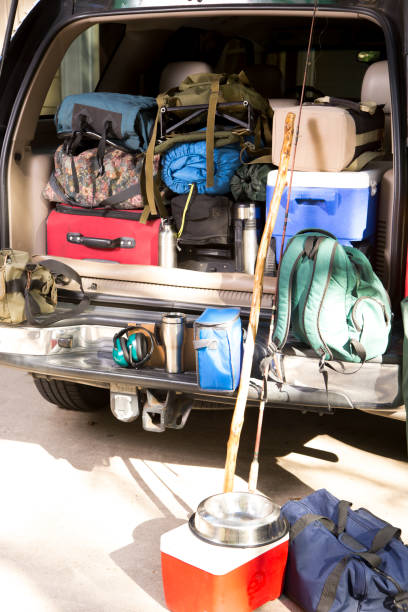 istock Packing vehicle for camping vacation trip. 1308319604
