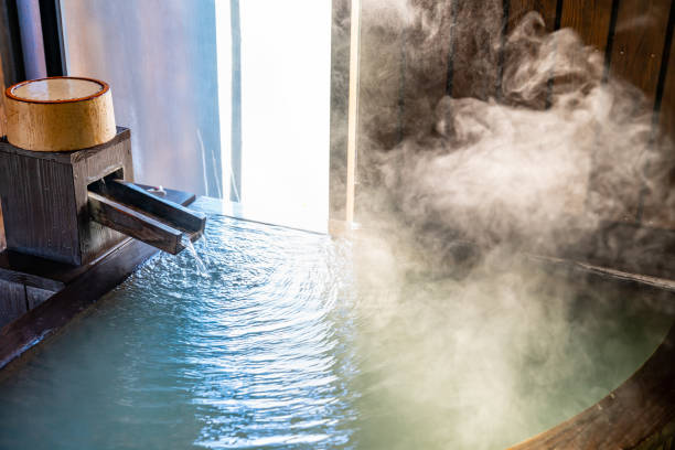 photo of a natural hot spring bath in a guest room with a hot spring - fonte térmica imagens e fotografias de stock