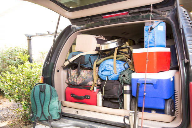 istock Packing vehicle for camping vacation trip. 1308320354