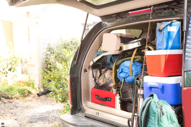 istock Packing vehicle for camping vacation trip. 1308320362