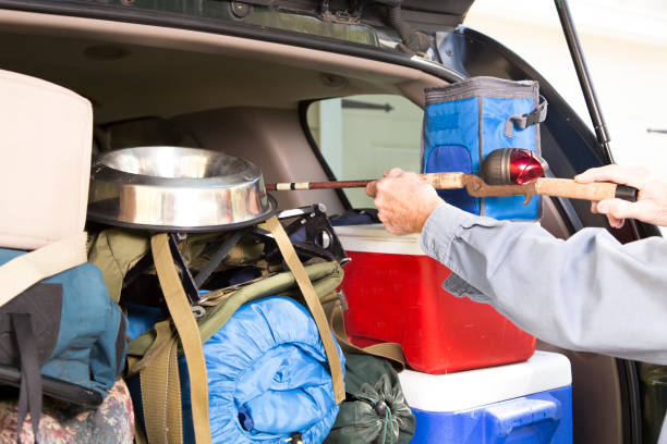 istock Packing vehicle for camping vacation trip. 1308320375