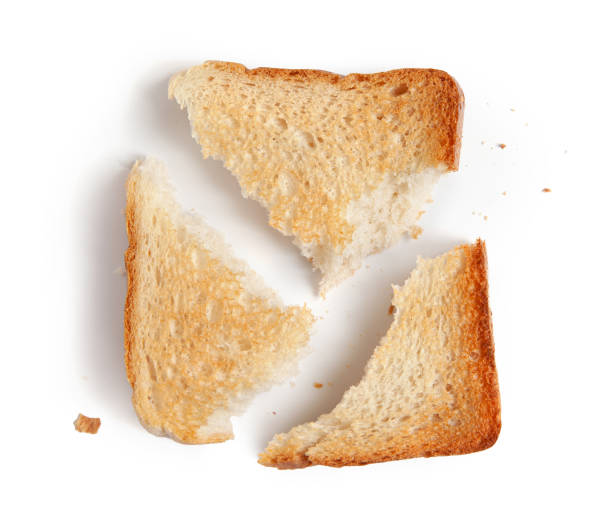 istock broken toasted bread slice isolated on white background, top view 1308320478