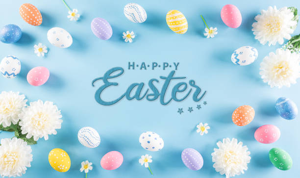 istock Happy easter! Colourful of Easter eggs with flower on pastel blue background. Greetings and presents for Easter Day celebrate time. Flat lay ,top view. 1308324832
