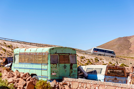 Machuca, Chile - October 01, 2016: Image of an Old abandoned bus in Machuca village, Atacama dessert, Antofagasta Region in Chile.