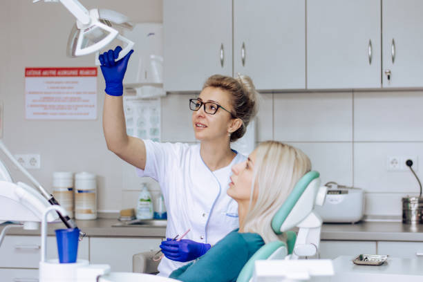 istock Dentist is starting a checkup to her patient 1308332851