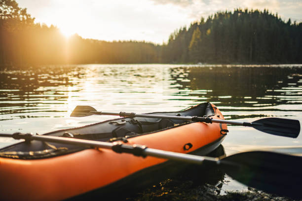 istock Kayak boat near a lake at sunset. 1308333782