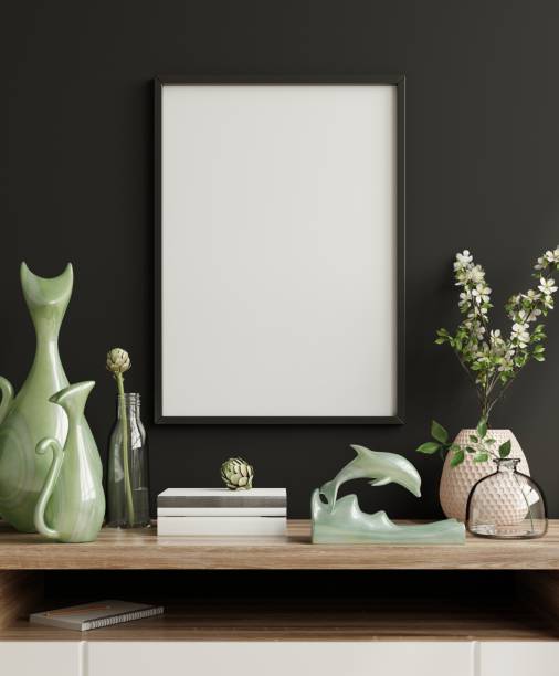 istock Mockup frame on cabinet in living room interior on empty dark wall background. 1308343259