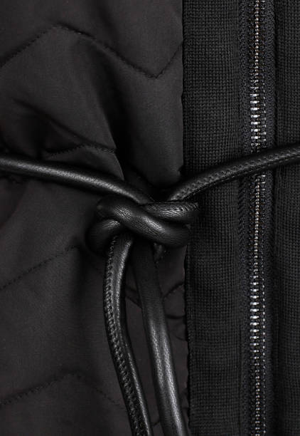 istock Close-up of down jacket black color with zipper 1308356543
