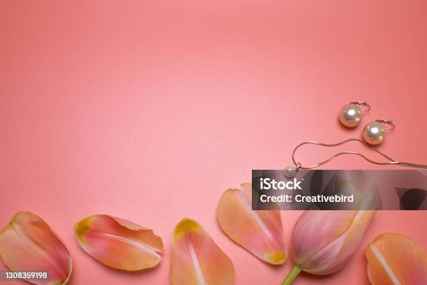 Beauty Background With Jewelry And Petals With Free Space For Text Stock Photo - Download Image Now