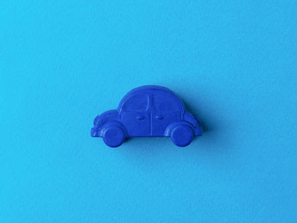 istock Dark blue car on a light blue background. 1308360776