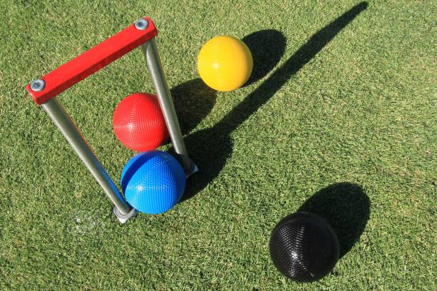 istock Croquet balls and hoop from an overhead angle 1308363448