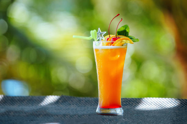 istock Orange cocktail with cherries, mint and orange slices 1308367094