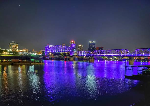 Little Rock, Arkansas An illuminated Little Rock, Arkansas skyline on an autumn's evening as viewed from the banks of the Arkansas River. michael dean shelton stock pictures, royalty-free photos & images