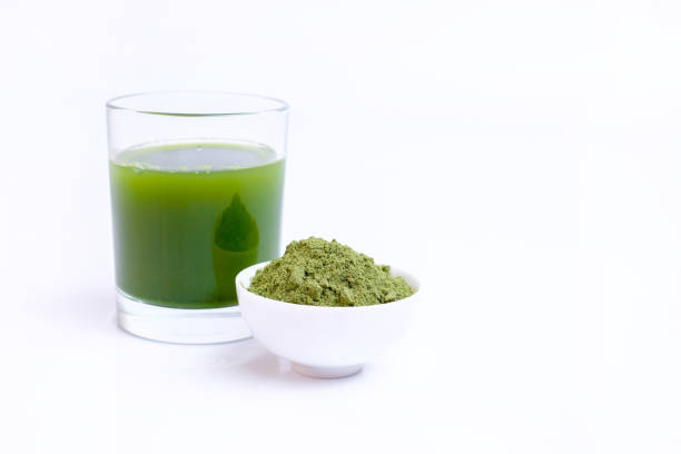 istock Green vegetable juice  and Powder 1308370315