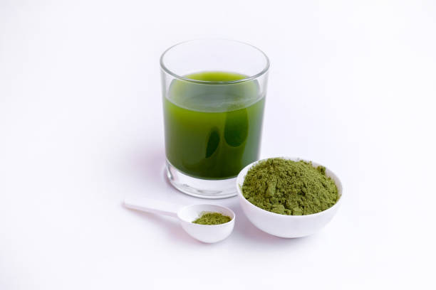 istock Green vegetable juice  and Powder 1308370317