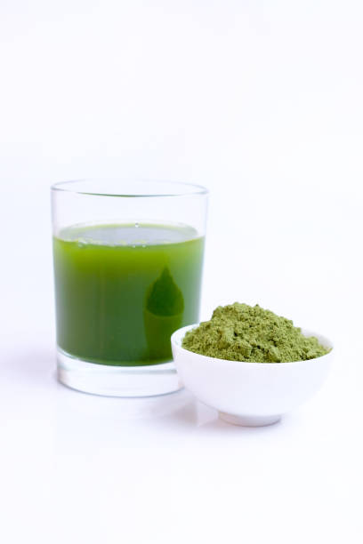 istock Green vegetable juice  and Powder 1308370318