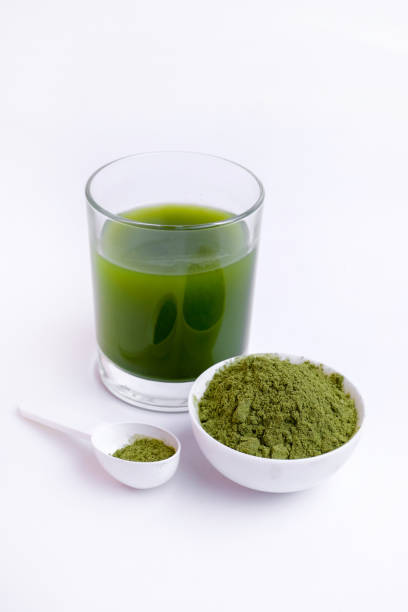 istock Green vegetable juice  and Powder 1308370319