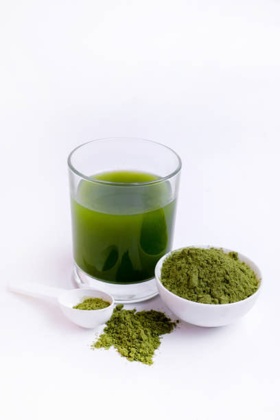 istock Green vegetable juice  and Powder 1308370334