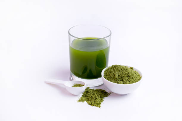 istock Green vegetable juice  and Powder 1308370338