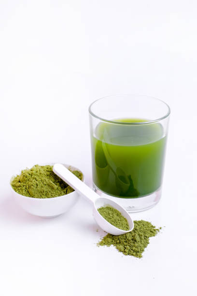 istock Green vegetable juice  and Powder 1308370339