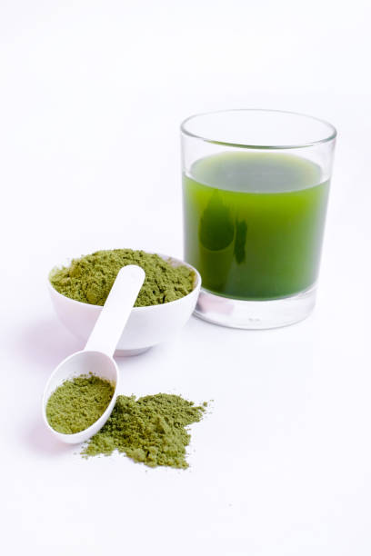 istock Green vegetable juice  and Powder 1308370347