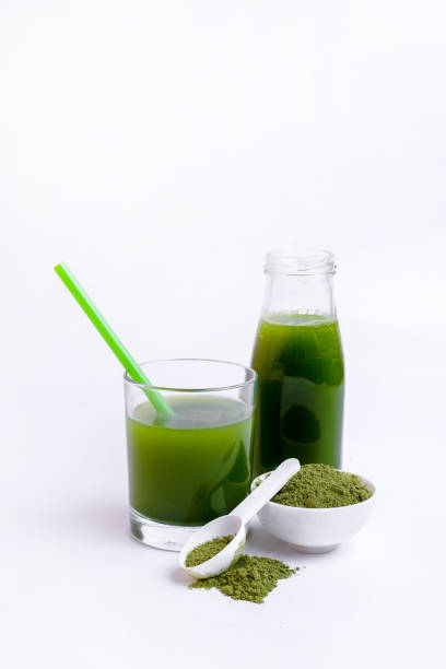 istock Green vegetable juice  and Powder 1308370352