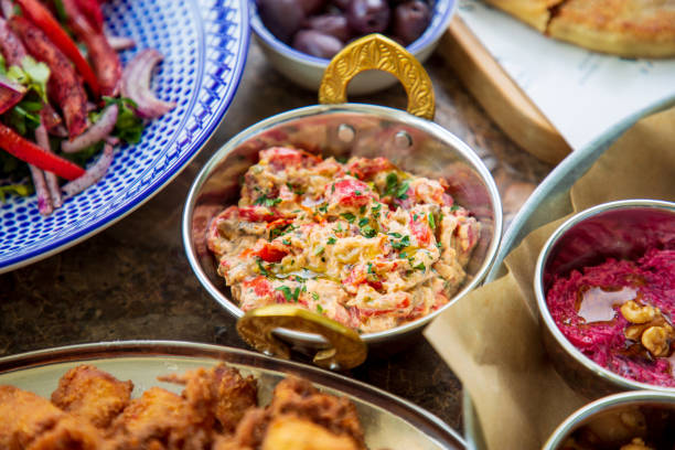 istock Baba Ghanoush Middle Eastern specialty garnished with basil, served on buffet 1308372964