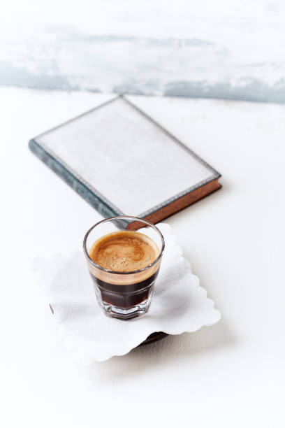 istock Cup of coffee on bright wooden background. Copy space. 1308373064