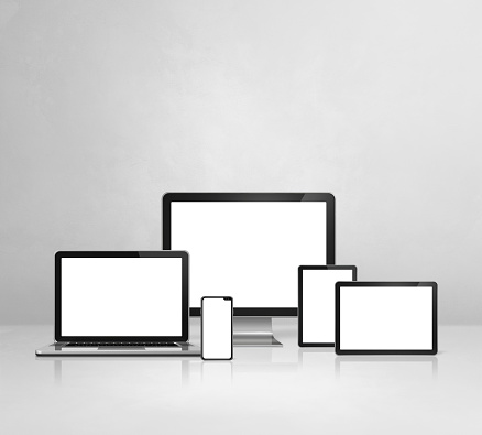 Computer, laptop, mobile phone and digital tablet pc - white concrete office desk background. 3D Illustration