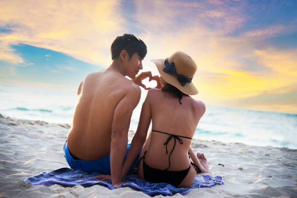 Happy Young cute couple at sea
