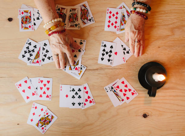 istock Guessing cards reading, grandma magic, fortune telling, women hands, destiny prediction 1308380149