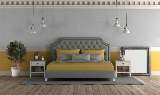 istock Gray and yellow master bedroom in retro style 1308382141