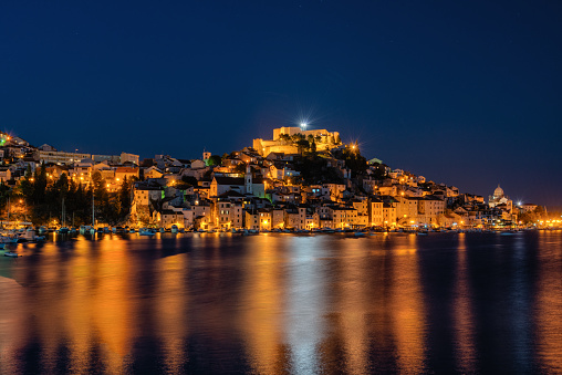 Adriatic sea coastline at night, small old town in Croatia