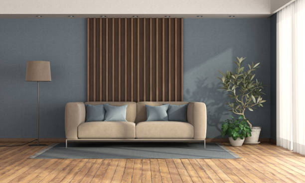 istock Living room with sofa against wooden panel 1308382210