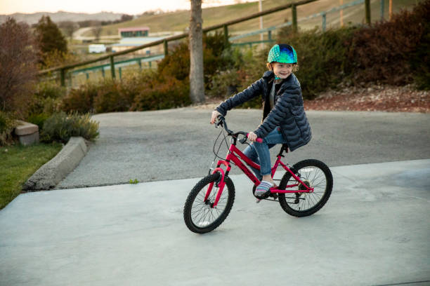 istock Girl riding Bicycle 1308388454