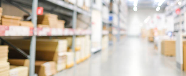 istock Blurred business background, Blur warehouse with bokeh light background 1308390957