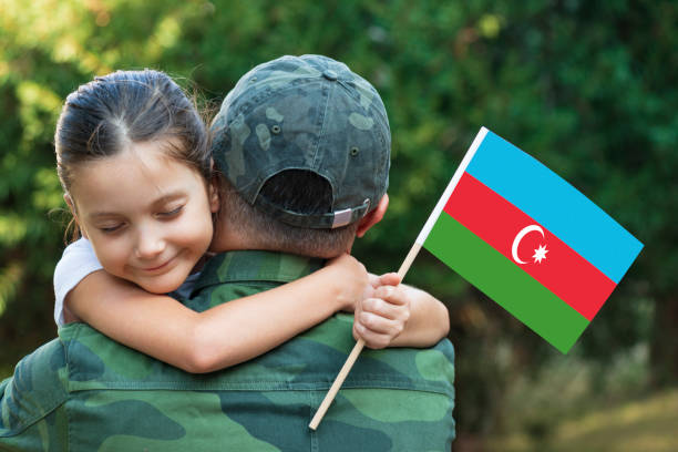 istock Azerbaijan Soldier And His Daughter 1308392605