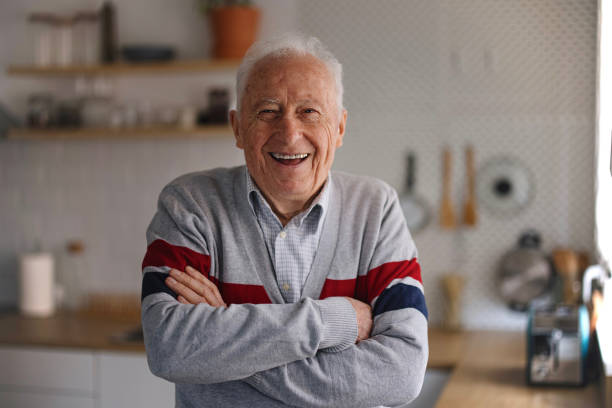 istock Smiling senior at home 1308394081