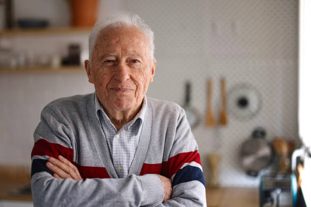 istock Smiling senior at home 1308394167