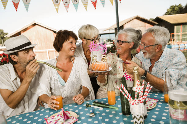 istock Senior people celebrating birthday 1308396581