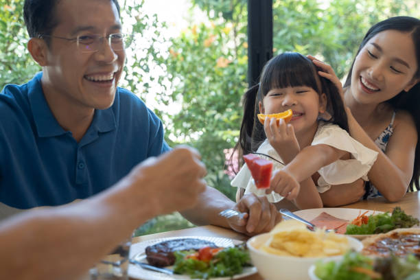 Asian family having a happy meal