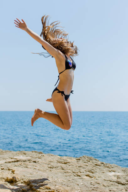 istock Girl at the sea 1308400523