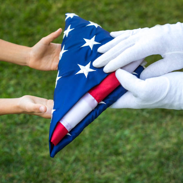 istock Ceremony of a giving a folded flag 1308400741
