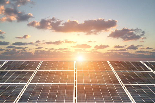 Solar panels renewable energy sunset